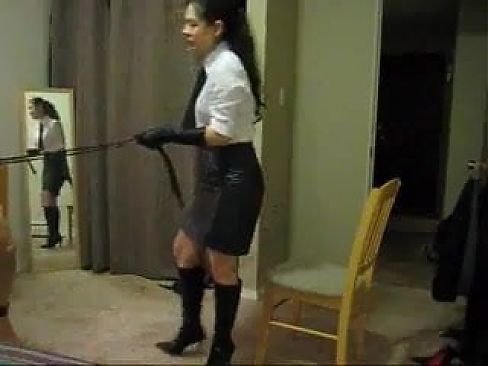 Asia mistress in leather skirt